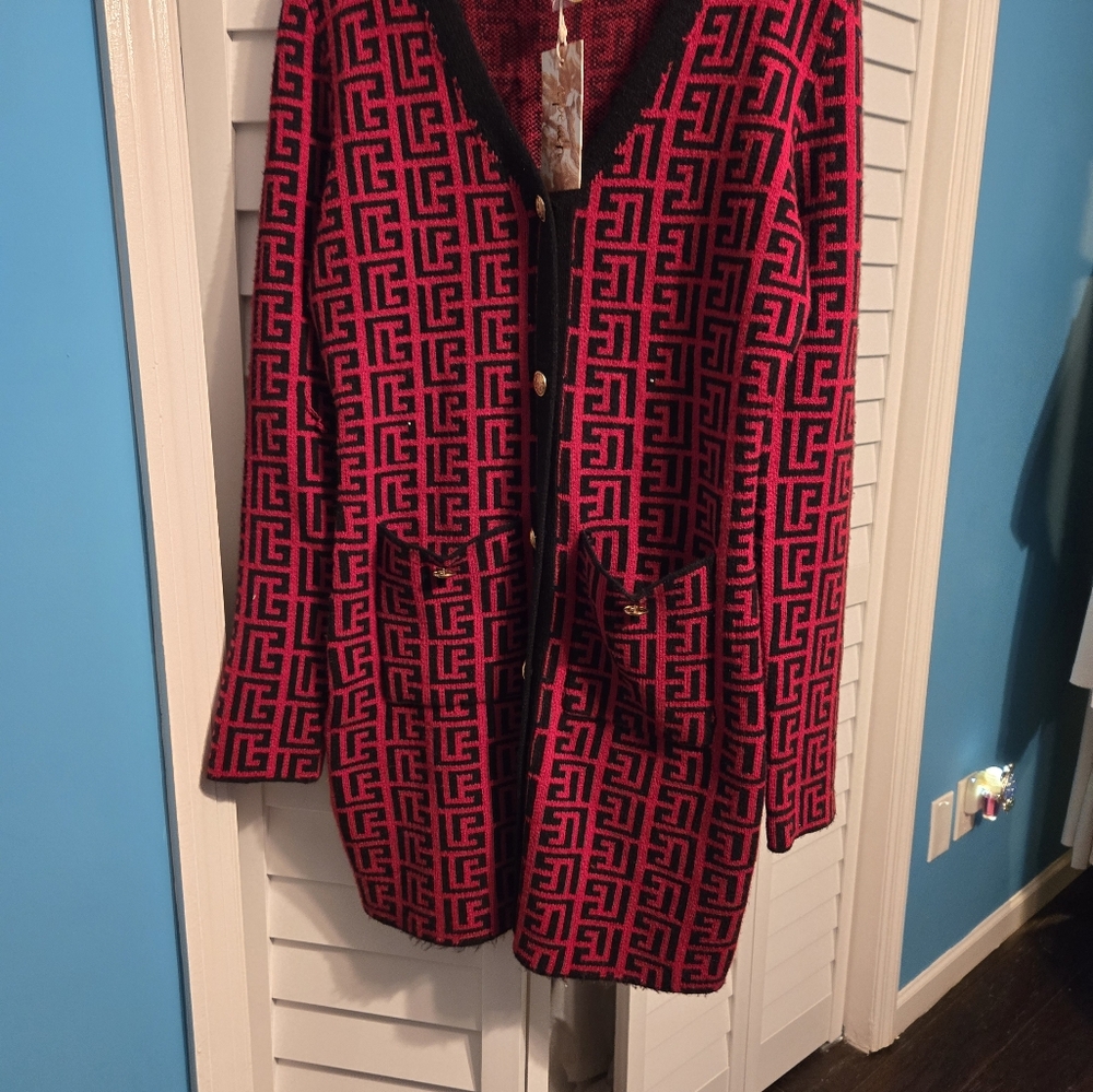 A. PEACH RED AND BLACK DRESS